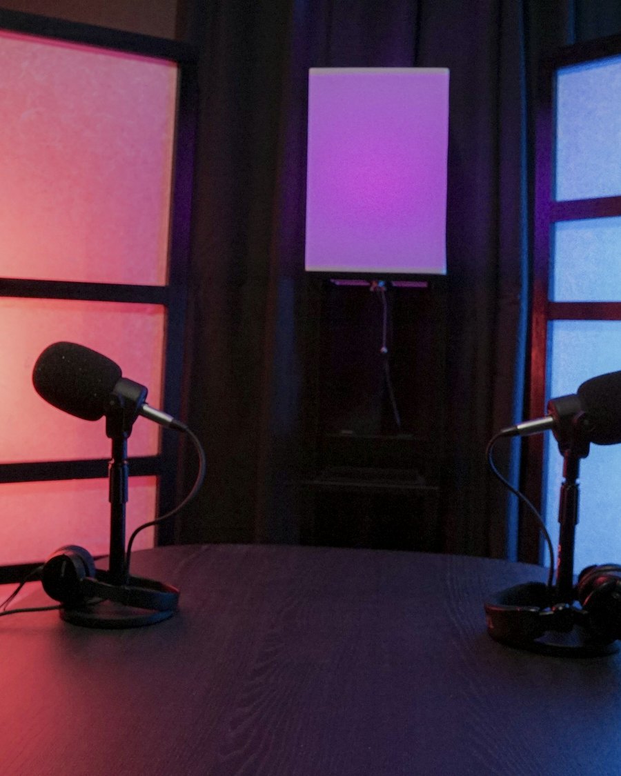 Two microphones in a podcast studio